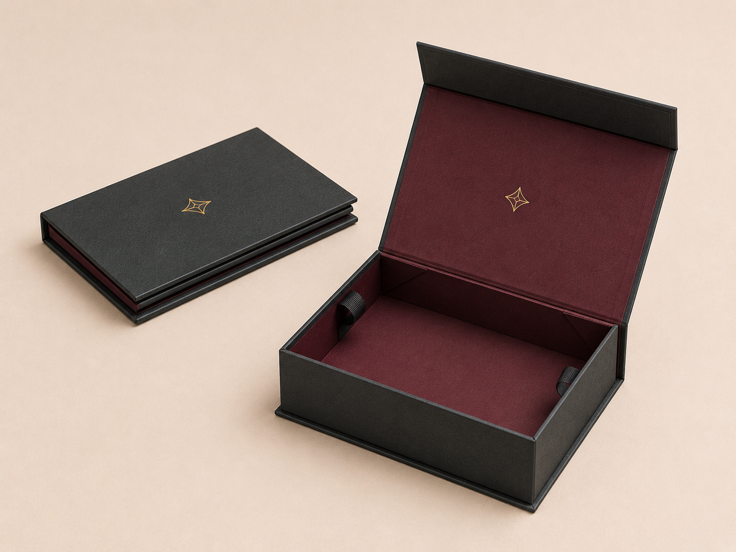 Black and burgundy fold-flat presentation boxes shown assembled and flat